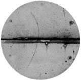 Anderson publishes observation of positron