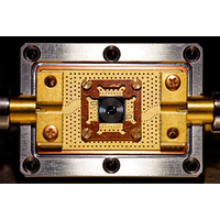 Josephson traveling-wave parametric amplifier based on a low-intrinsic ...