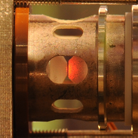 Two-Photon Blockade in an Atom-Driven Cavity QED System | Phys. Rev. Lett.
